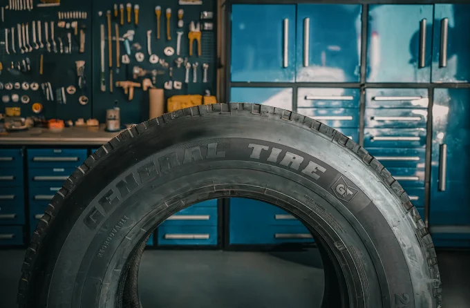 Commercial truck tire and professional tools at Sam's repair shop in Toledo